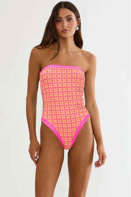 Shop Ambrose One Piece Citrus Tile featuring a vibrant citrus tile print, flattering silhouette, and comfortable design for beach and pool wear.