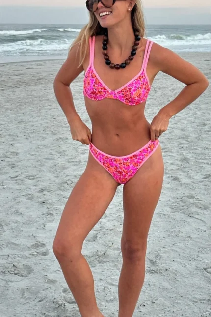 Shop Daria Bottom Orange Bud featuring a vibrant orange print, flattering silhouette, and comfortable swim design for beach and pool wear.